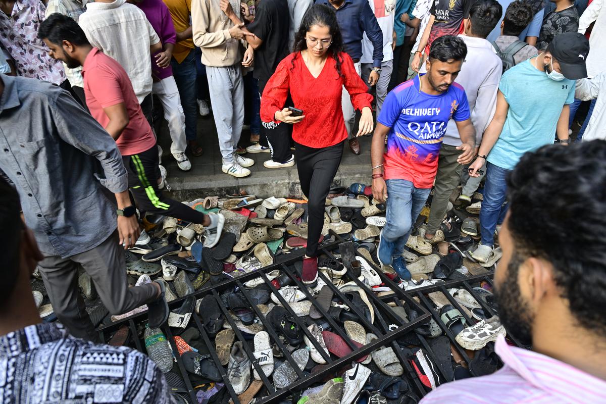 Scene at one of the gates of M. Chinnaswamy Stadium after unruly RCB fans tried to gain forcible entry during the IPL victory celebration in Bengaluru.