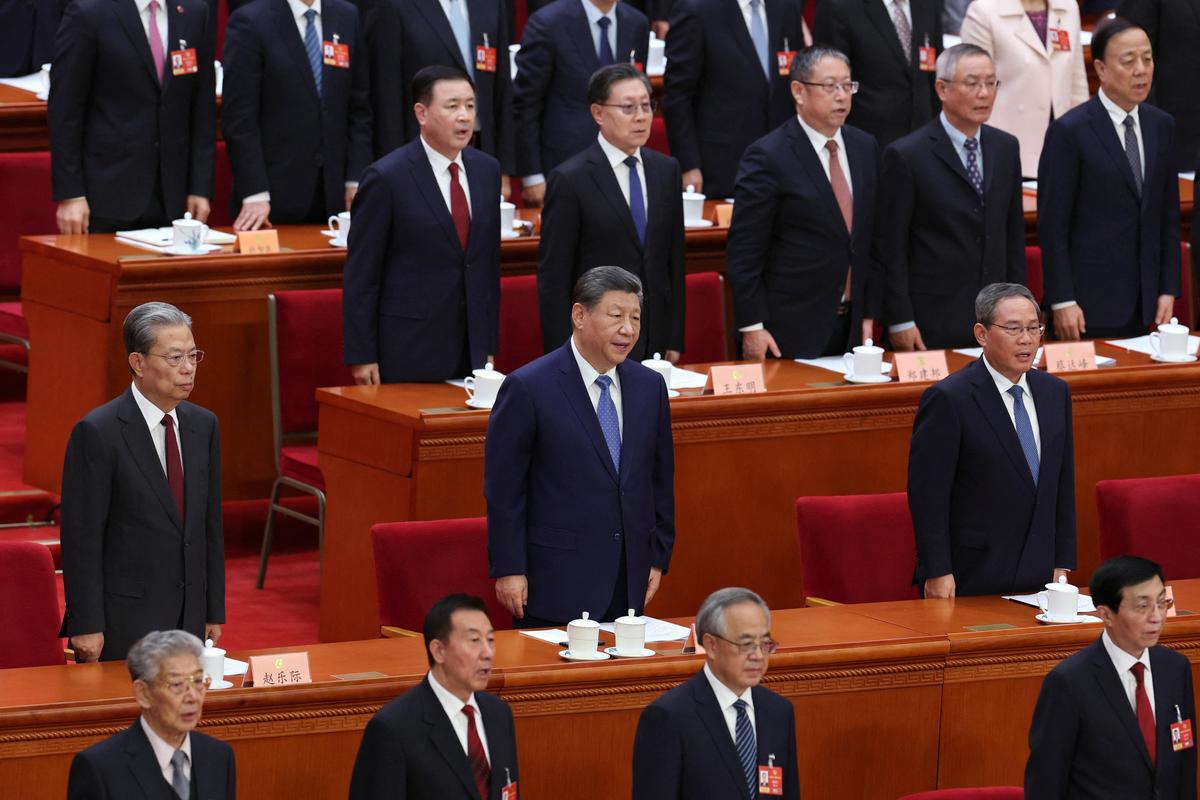 Chinese President Xi Jinping and other leaders sing the national anthem during the opening session of the Chinese People's Political Consultative Conference (CPPCC), at the Great Hall of the People in Beijing, China, on March 4, 2026.