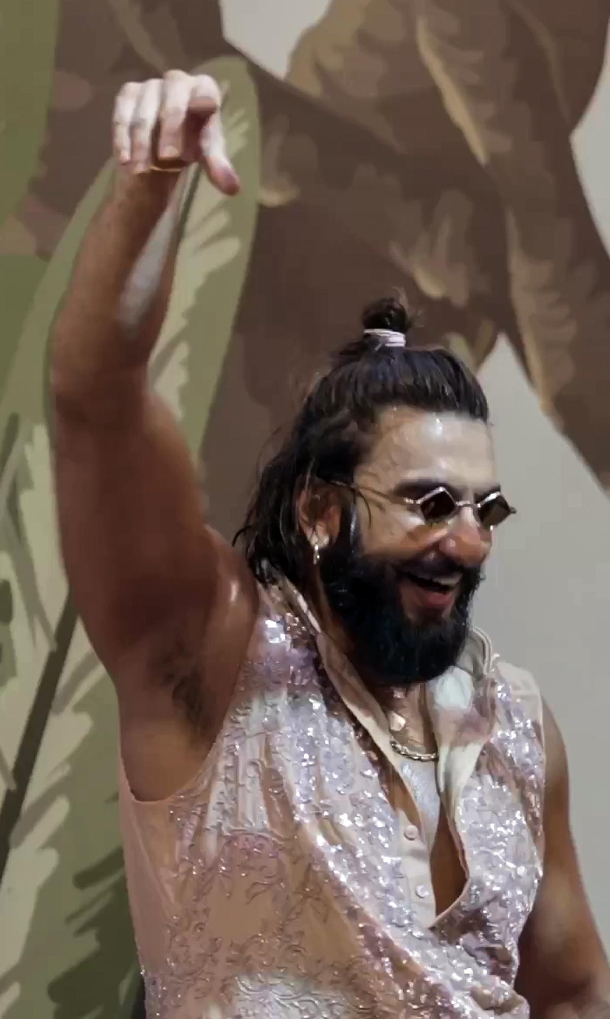 Bollywood actor Ranveer Singh dances during the wedding celebrations of Anant Ambani, son of Reliance Industries Chairman Mukesh Ambani, and Radhika Merchant, at the Jio World Convention Centre in Mumbai on Friday. Bollywood actor Ranveer Singh dances during the wedding celebrations of Anant Ambani, son of Reliance Industries Chairman Mukesh Ambani, and Radhika Merchant, at the Jio World Convention Centre in Mumbai on Friday.