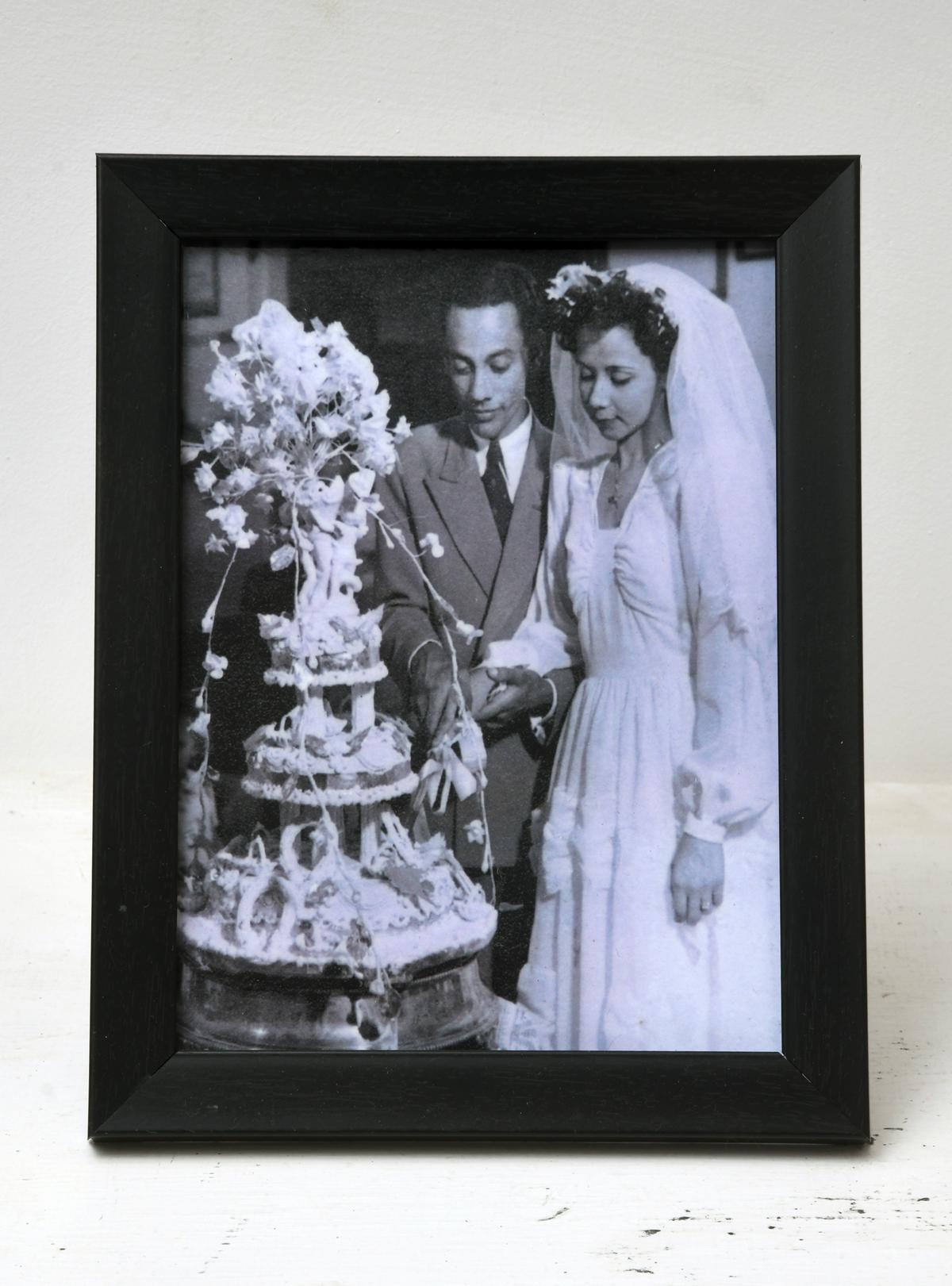 The multi-tiered wedding cake is the centre-piece of the Anglo-Indian wedding reception. 