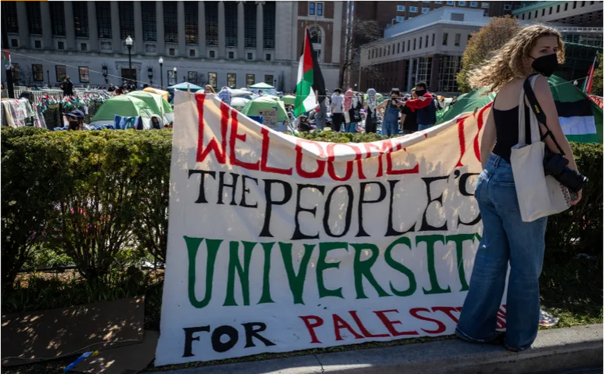 A sign is displayed in front of the pro-Palestinian encampment at Columbia University in New York on April 22, 2024
