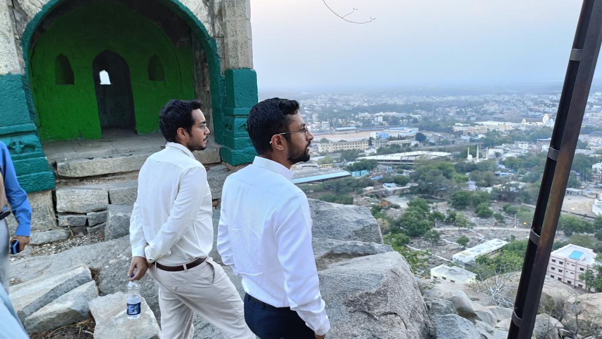 Deputy Commissioner Nitish K. (right) at the historic hilltop fort in Raichur on April 22, 2025.