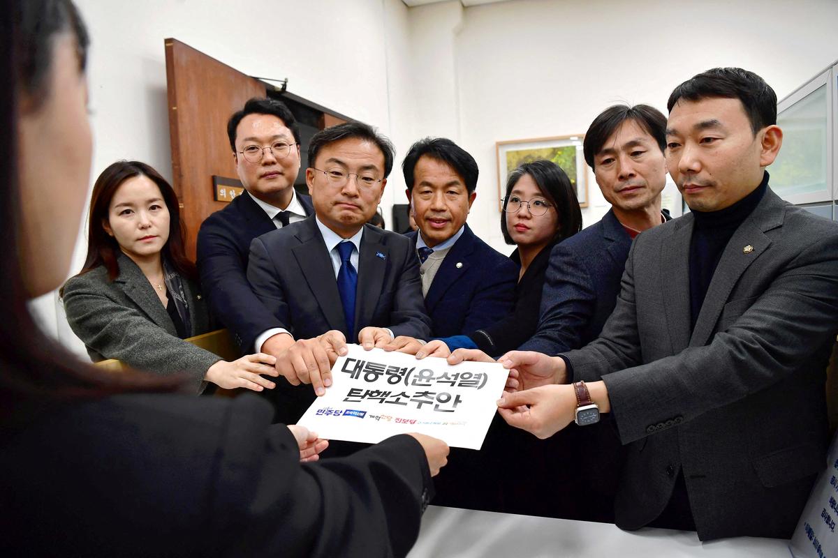 South Korean lawmakers submit a impeachment motion of South Korean President Yoon Suk Yeol at the National Assembly in Seoul, South Korea on December 4, 2024. 