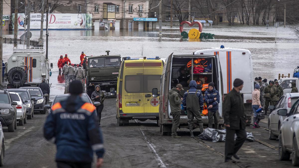 Russians stage a rare protest after a dam bursts and homes flood near the Kazakh border