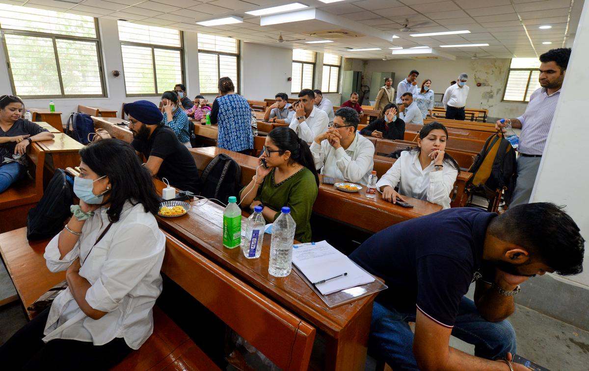 Hospital staff collect DNA samples of relatives at the Civil Hospital.