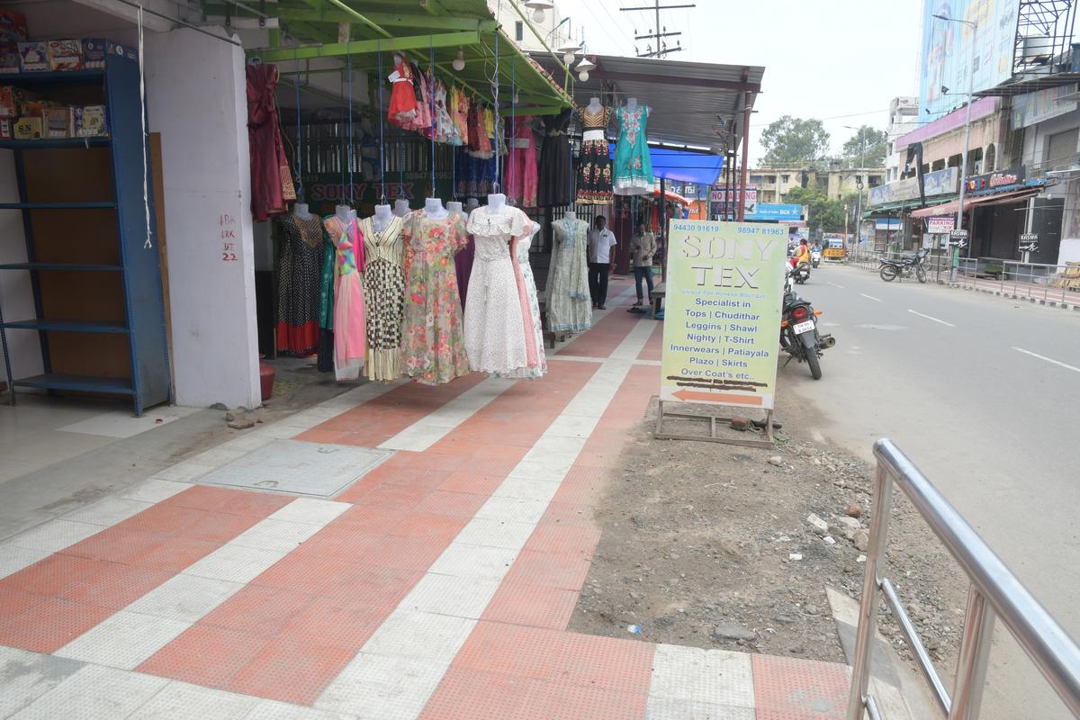 Traders erect permanent roof shelters on footpaths, encroach upon space in Erode