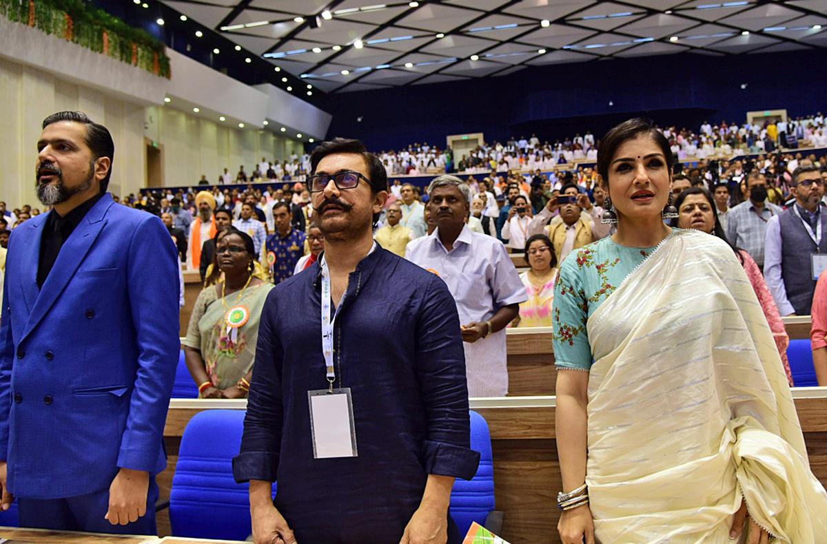  Bollywood actors Aamir Khan, Raveena Tandon, Grammy award winner Ricky Kej and others at the inauguration of National conclave ‘Mann Ki Baat @100’ at Vigyan Bhawan in New Delhi on Wednesday. 