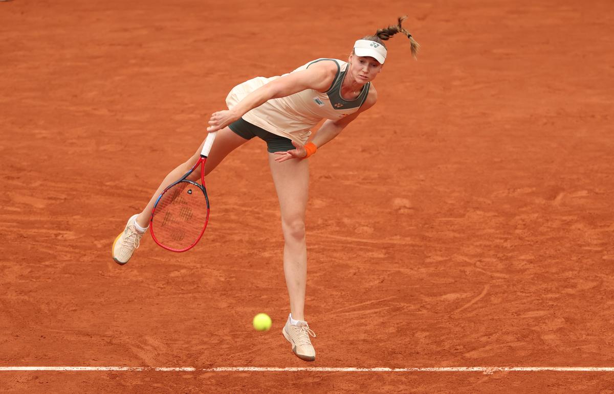 Kazakhstan Elena Rybakina serves against Arantxa Rus of the Netherlands.