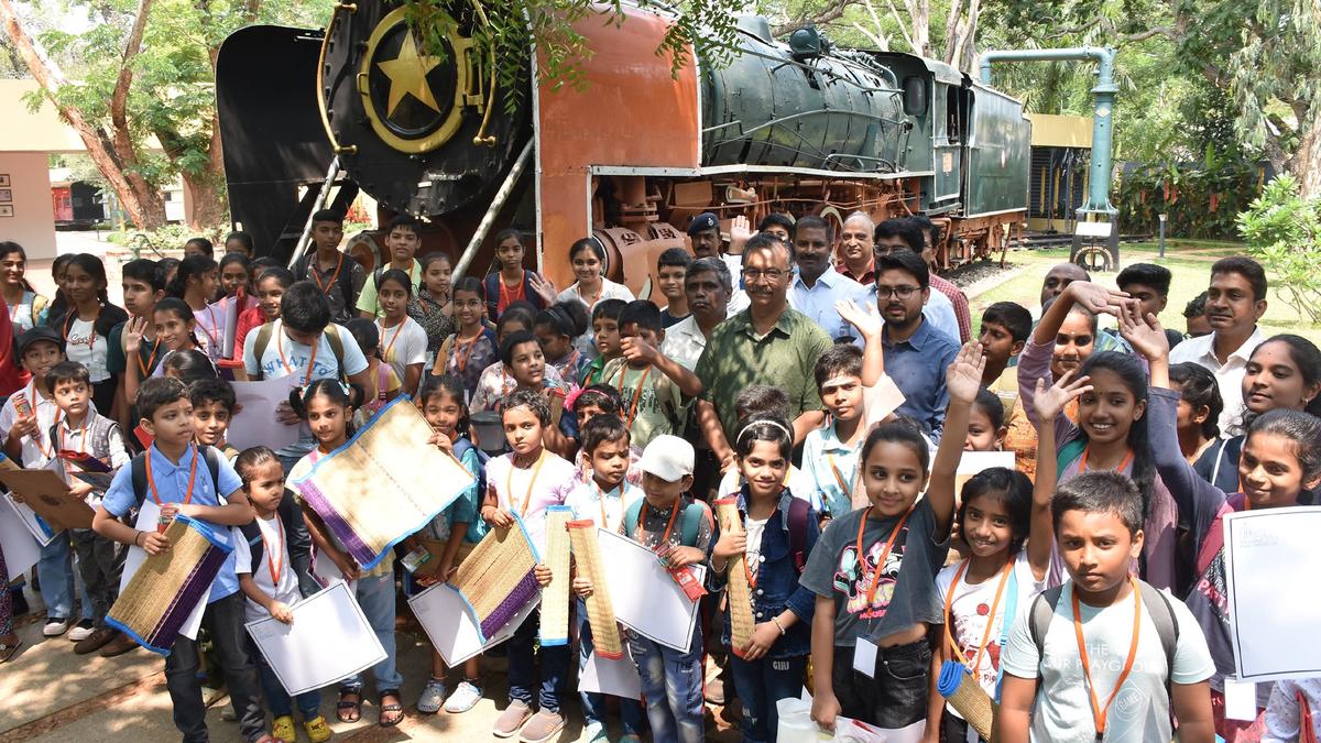 Children receive prizes for Heritage Day poster-making and painting contest