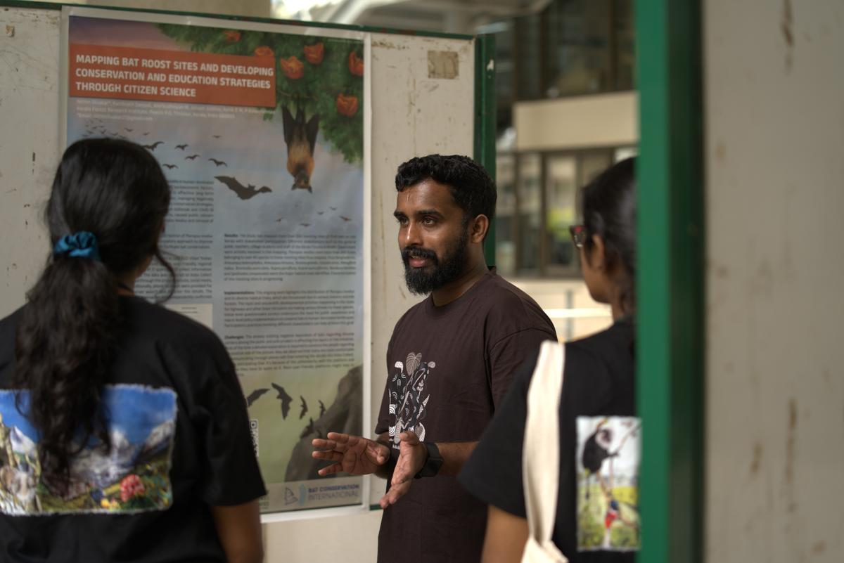  Participants displaying their research through vibrant posters. 