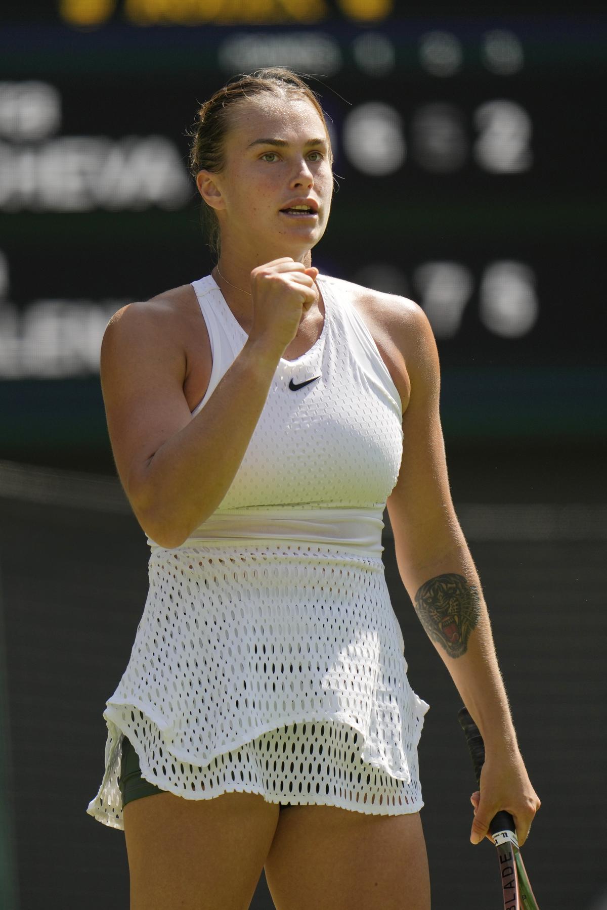 Aryna Sabalenka of Belarus celebrates defeating Varvara Gracheva of France in the women’s singles match on day five of the Wimbledon tennis championships in London on July 7, 2023. 