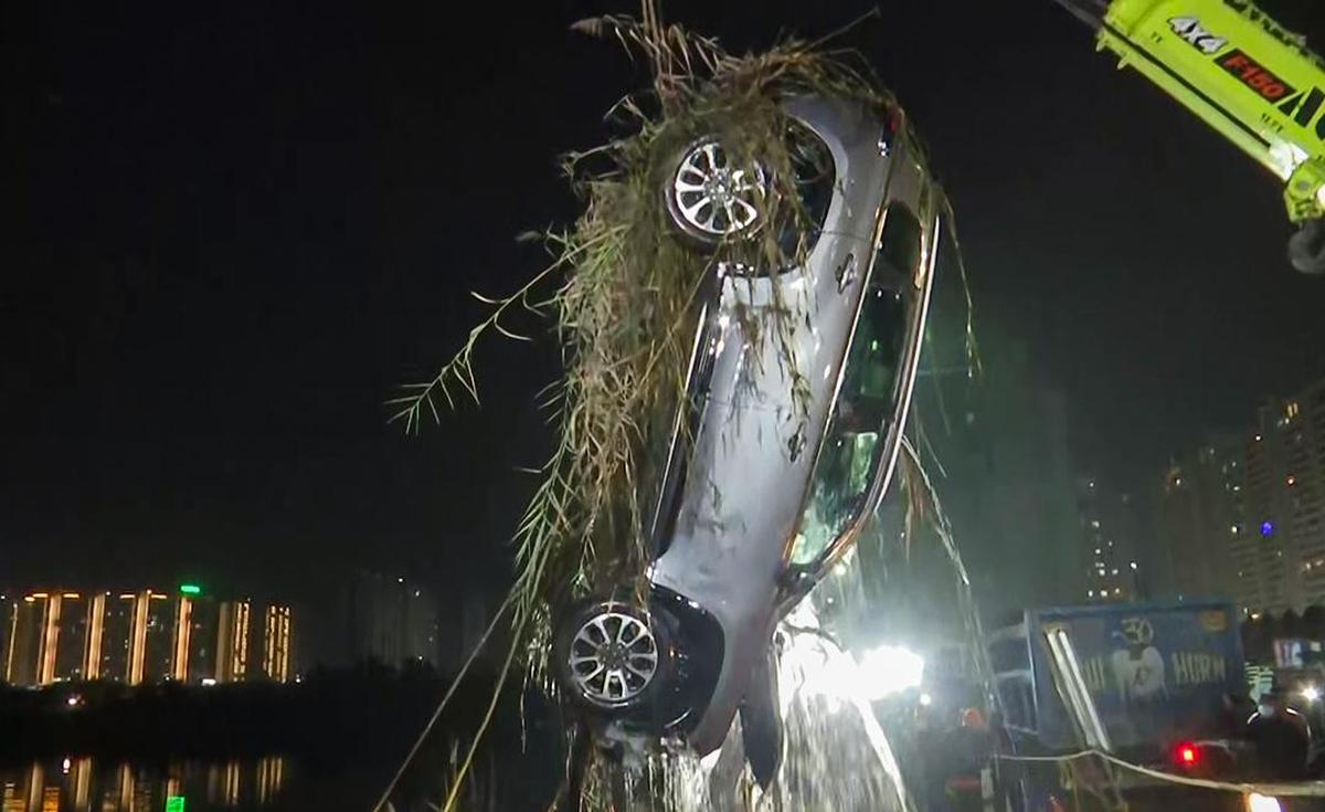 NDRF teams retrieve Yuvraj Mehta’s car from the water-filled pit at the Greater Noida construction site. NDRF teams retrieve Yuvraj Mehta’s car from the water-filled pit at the Greater Noida construction site.