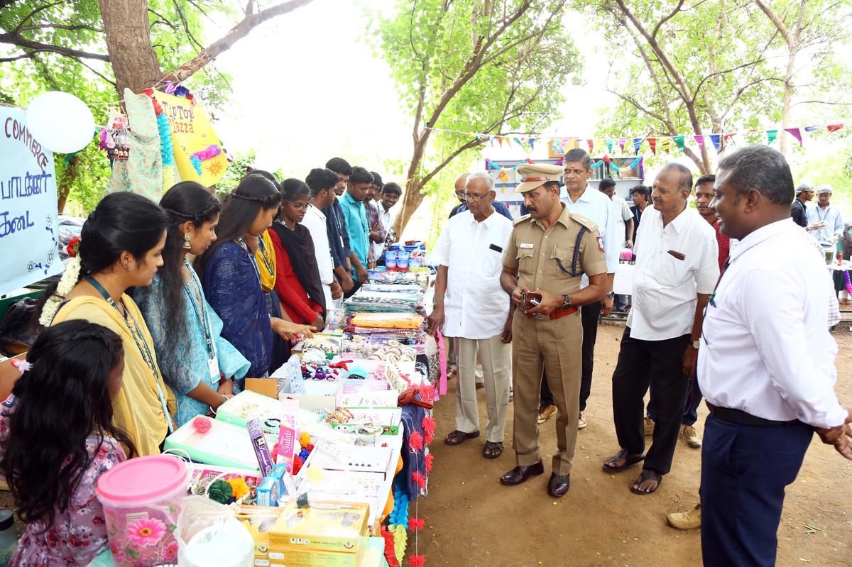 Dindigul: Students display their creative works at stalls organised in the programme. Dindigul: Students display their creative works at stalls organised in the programme.