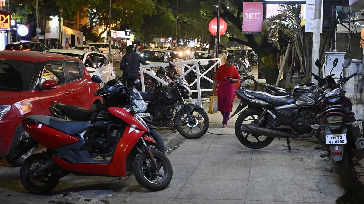 Shanthi Colony Road struggles with unregulated parking of vehicles