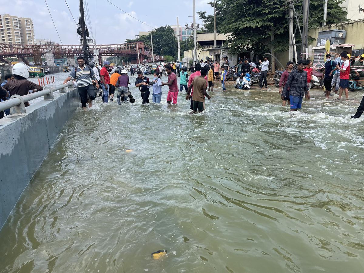 Techies working at IT companies on the ORR had to wade through knee-deep flood waters to get to their offices on August 30, 2022. 