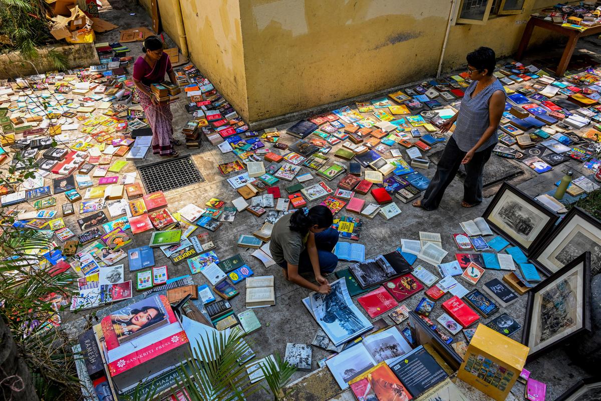 Books put out to dry after rainwater flooded Bookworm