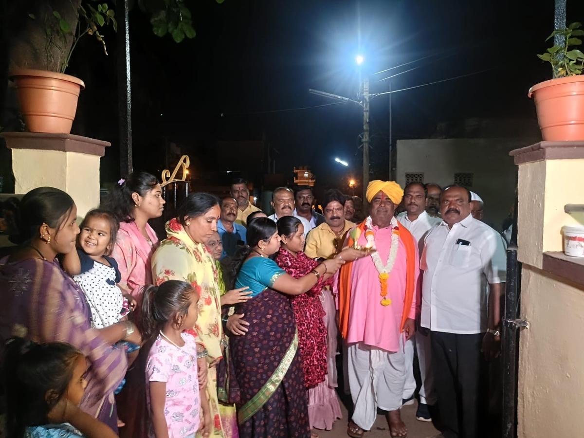 Neighbours and family members welcome Venkappa Ambaji Sugatekar, Gondhali singer after his return from a performance following the announcement of the Padma Shri award for him. 