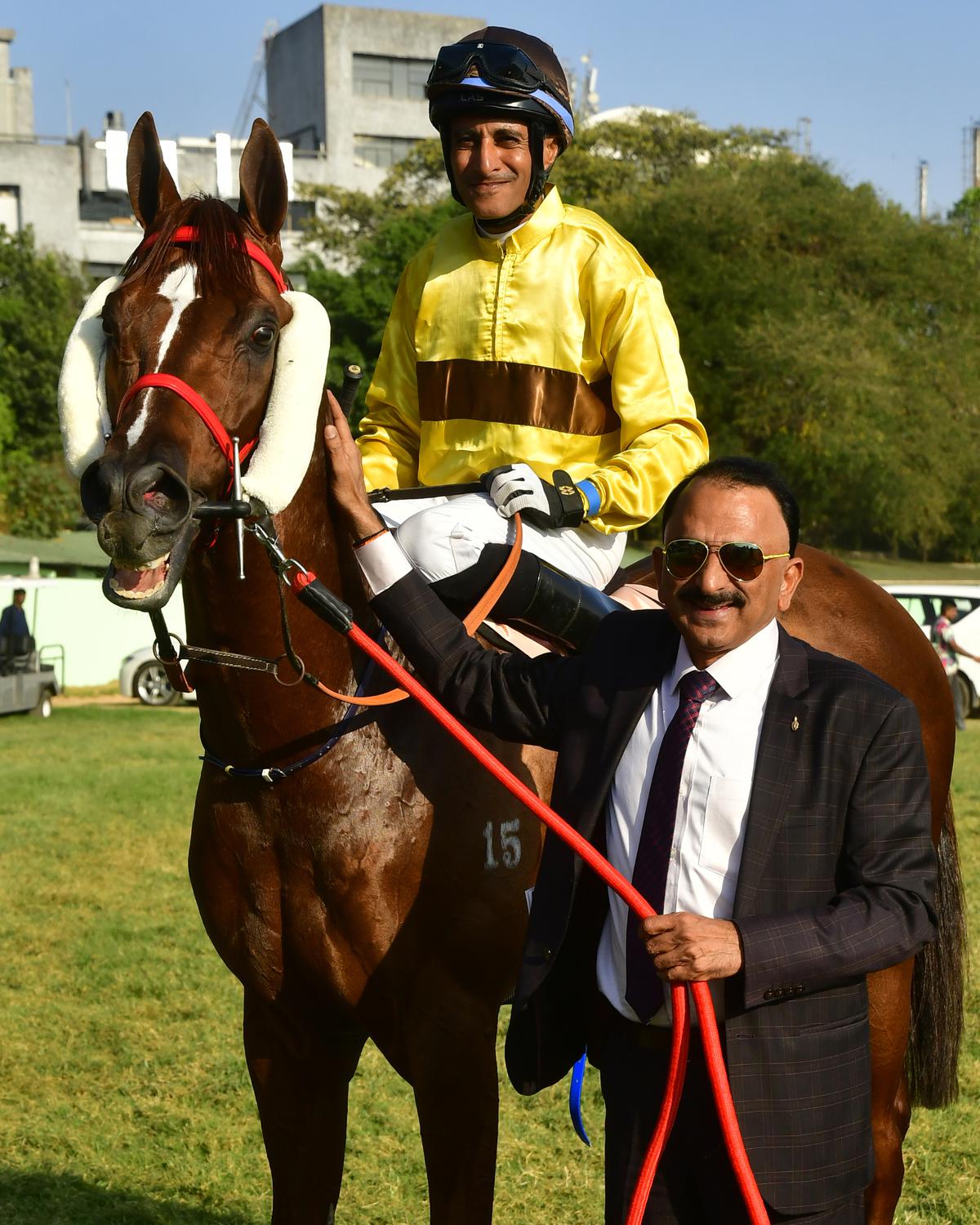 Trainer B. Suresh leading in My Opinion (Y.S. Srinath up) after the win in the Dr. M. A. M. Ramaswamy Chettiar of Chettinad Memorial Stayers’ Cup at the Bangalore Turf Club on March 04, 2023. 