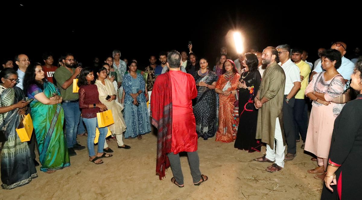 Sandeep Narayan singing by the beach.