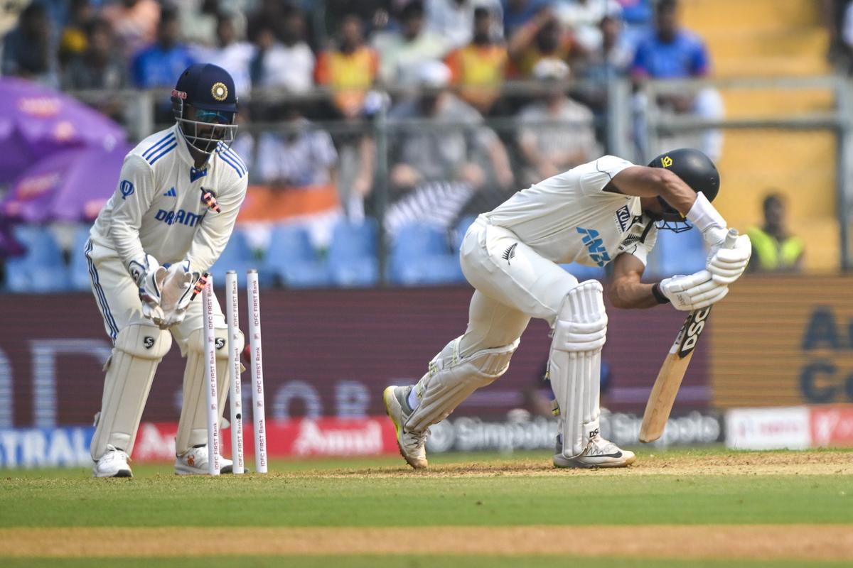 Rachin Ravindra is bowled by Washington Sundar on the first day of the third Test between India and New Zealand at the Wankhede Stadium in Mumbai on November 1, 2024.