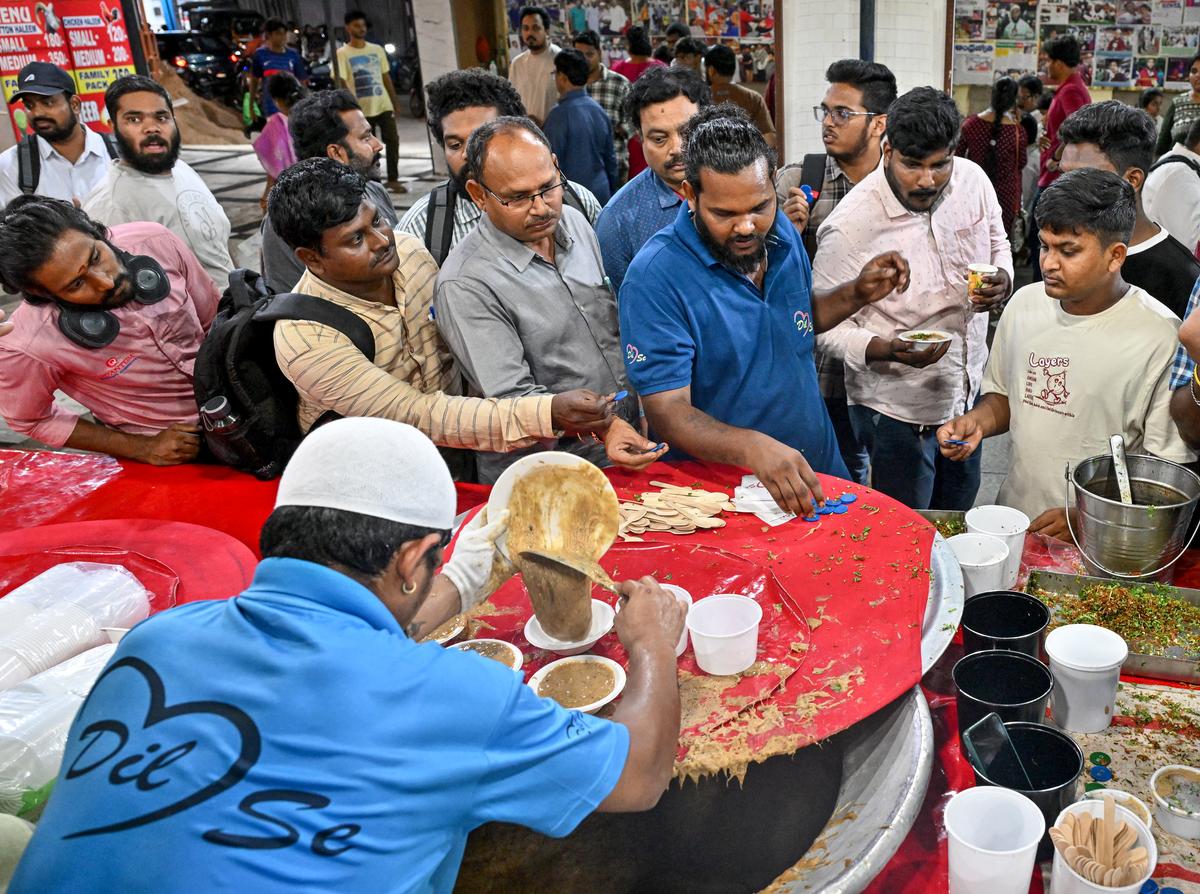 People buying haleem at a stall during Ramzan month near the Mecca Masjid in Jagadamba in Visakhapatnam.