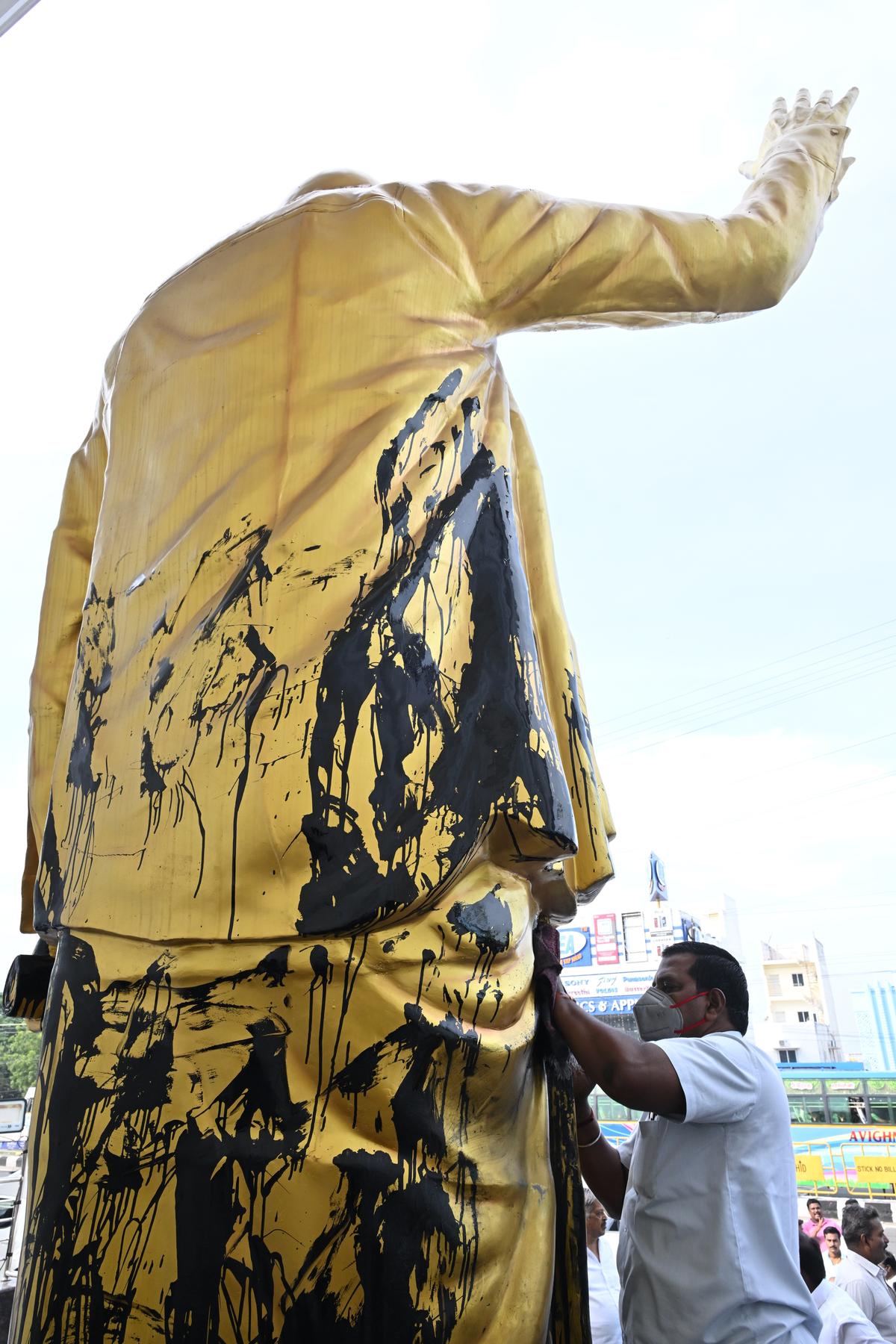 Black paint stains on the defaced statue of former Chief Minister M. Karunanidhi at Salem on July 15, 2025