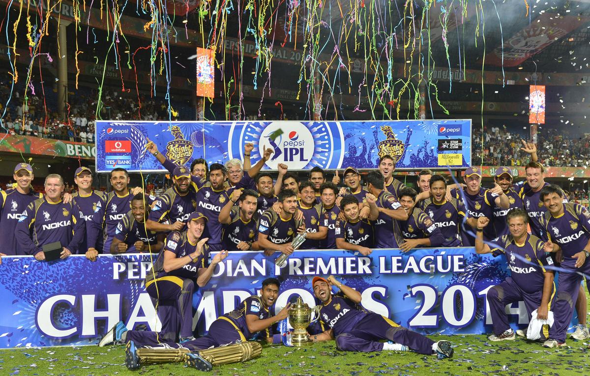Kolkata Knight Riders team celebrates their victory over Kings XI Punjab in the final of 7th Indian Premier League Twenty20 Cricket Tournament played at M. Chinnaswamy Stadium in Bangalore on June 1, 2014.