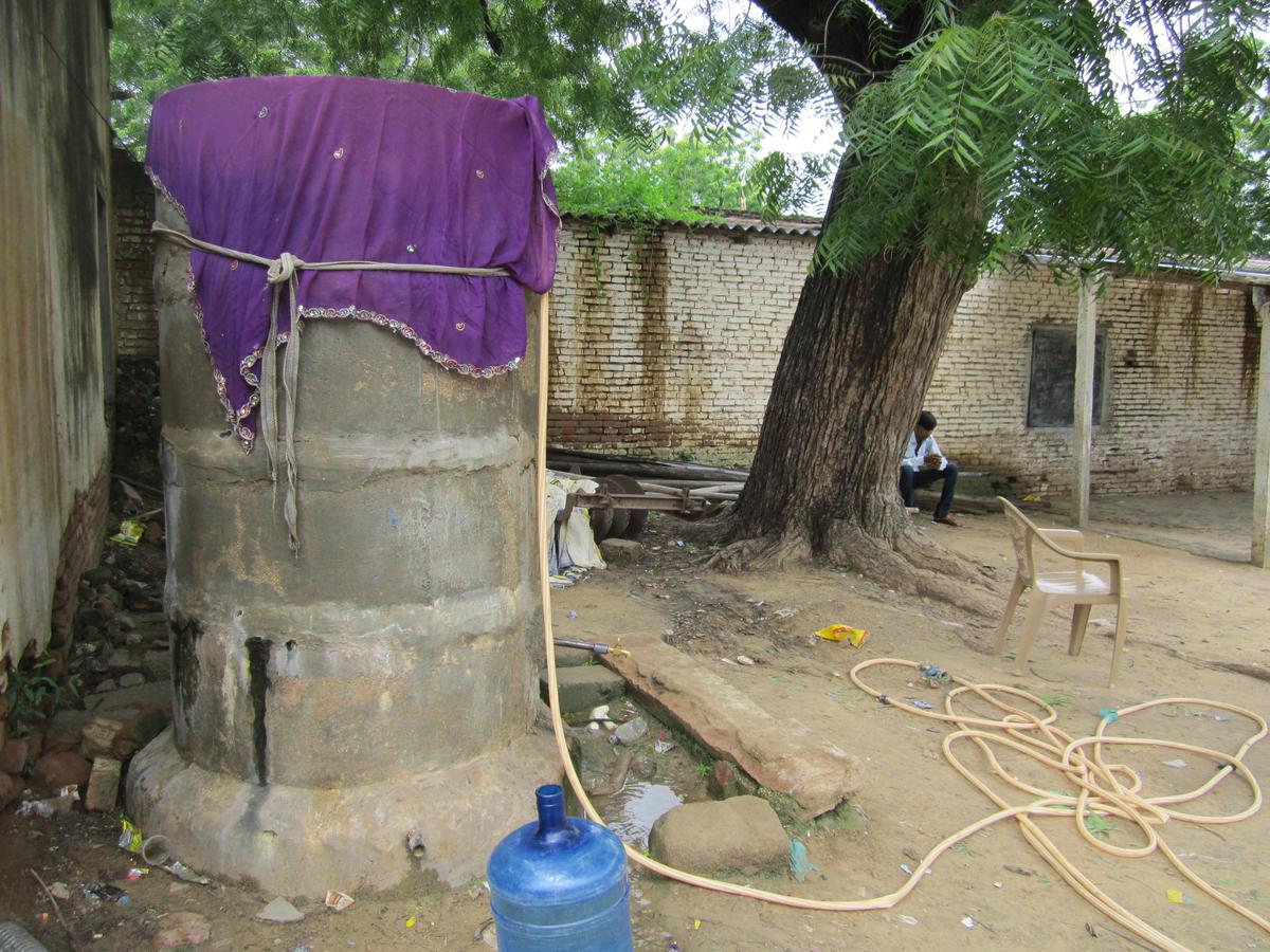 A cement water tank installed on the premises of Saraswati Vidya Mandir in Surana.