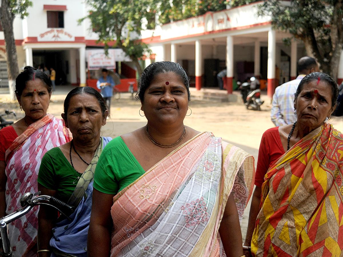 Women outside the office of All-India Matua Mahasangha.