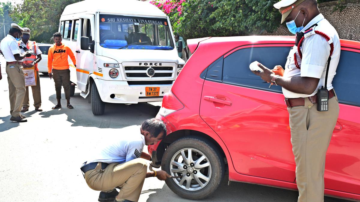 Traffic police clamp vehicles in ‘no parking’ zone in Coimbatore city