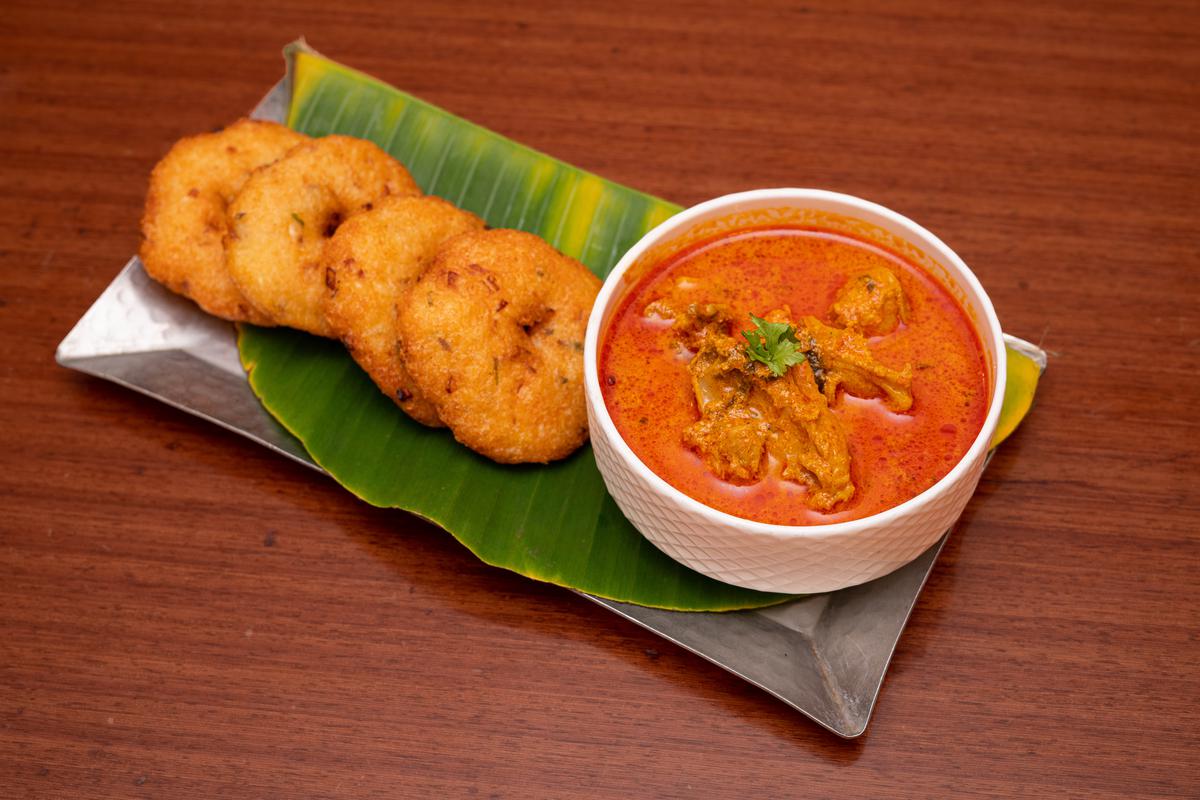 Garelu with Natu kodi pulusu Garelu with Natu kodi pulusu