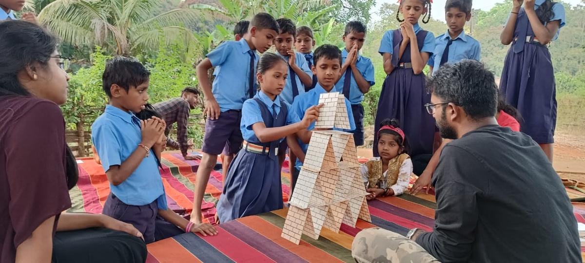 Government school children engaged in outdoor activities at Mudiye in Joida in Uttara Kannada under Vana Chethana activities of Sahyadri Sanchaya of Mangaluru.