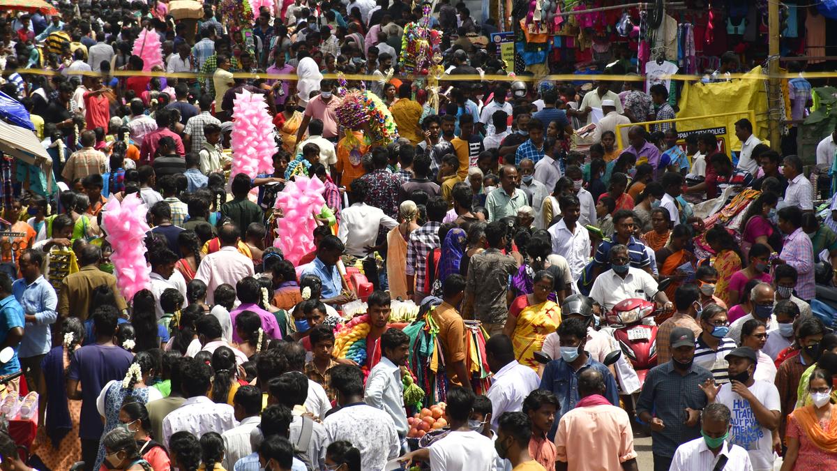 Shoppers throng commercial streets, but traders report dull business