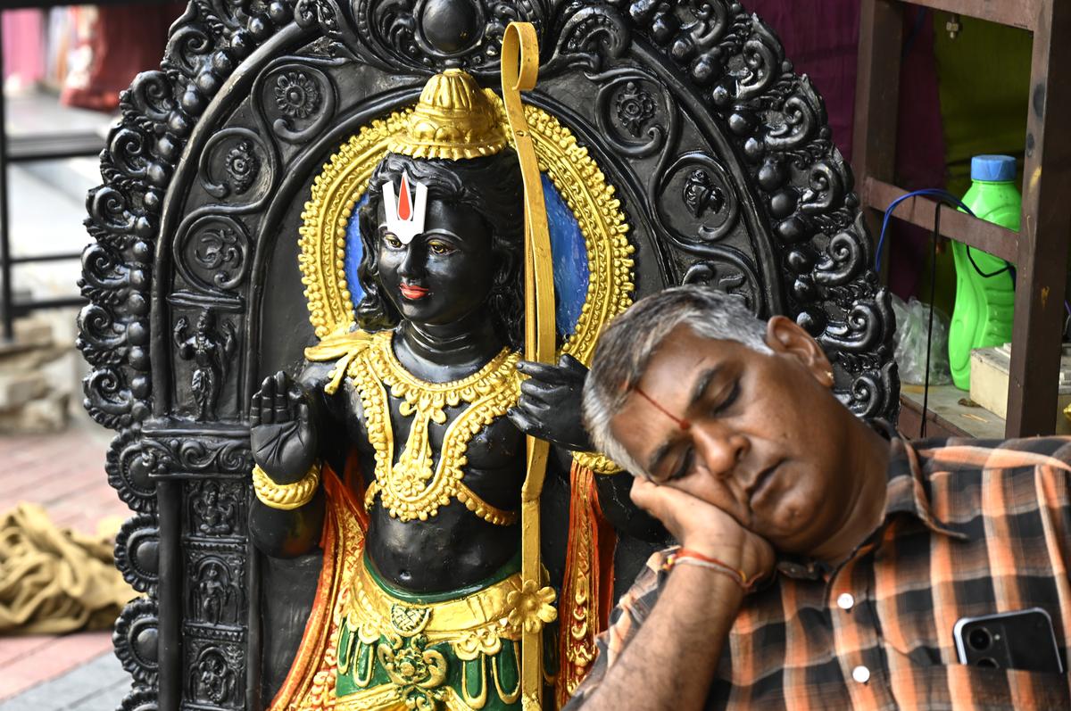 Suppliers took a nap while waiting for customers at a store before the Sri Ram Navami Festival in Hyderabad on Friday. Suppliers took a nap while waiting for customers at a store before the Sri Ram Navami Festival in Hyderabad on Friday.