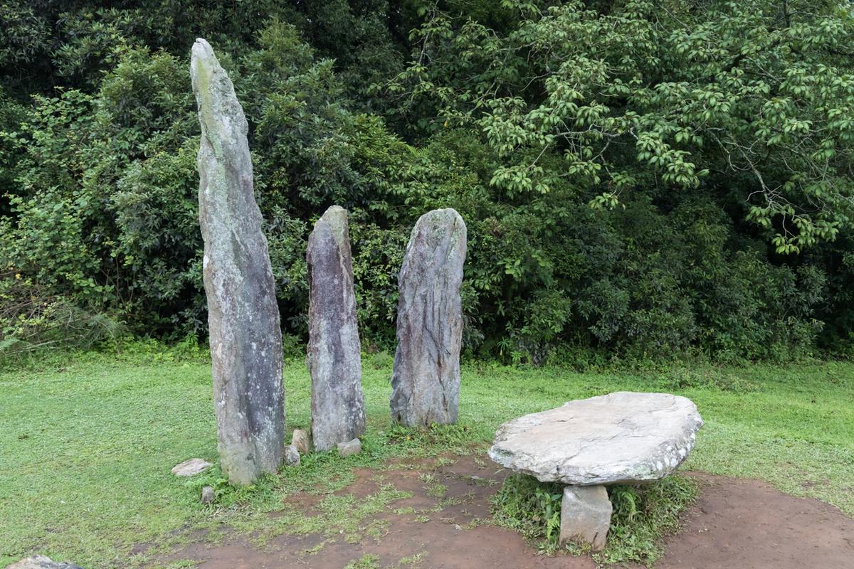 Ritual monoliths at the entrance of the Mawphlang sacred forests in Meghalaya.