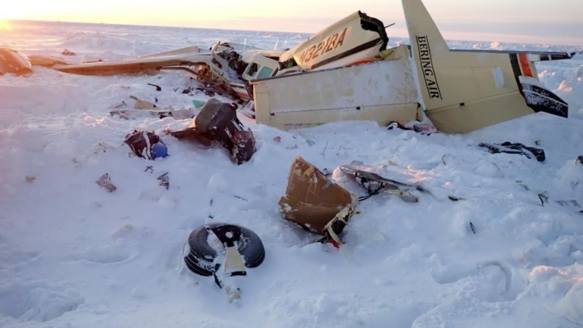 U.S. investigators say Alaska plane was overweight for icy conditions in crash that killed 10