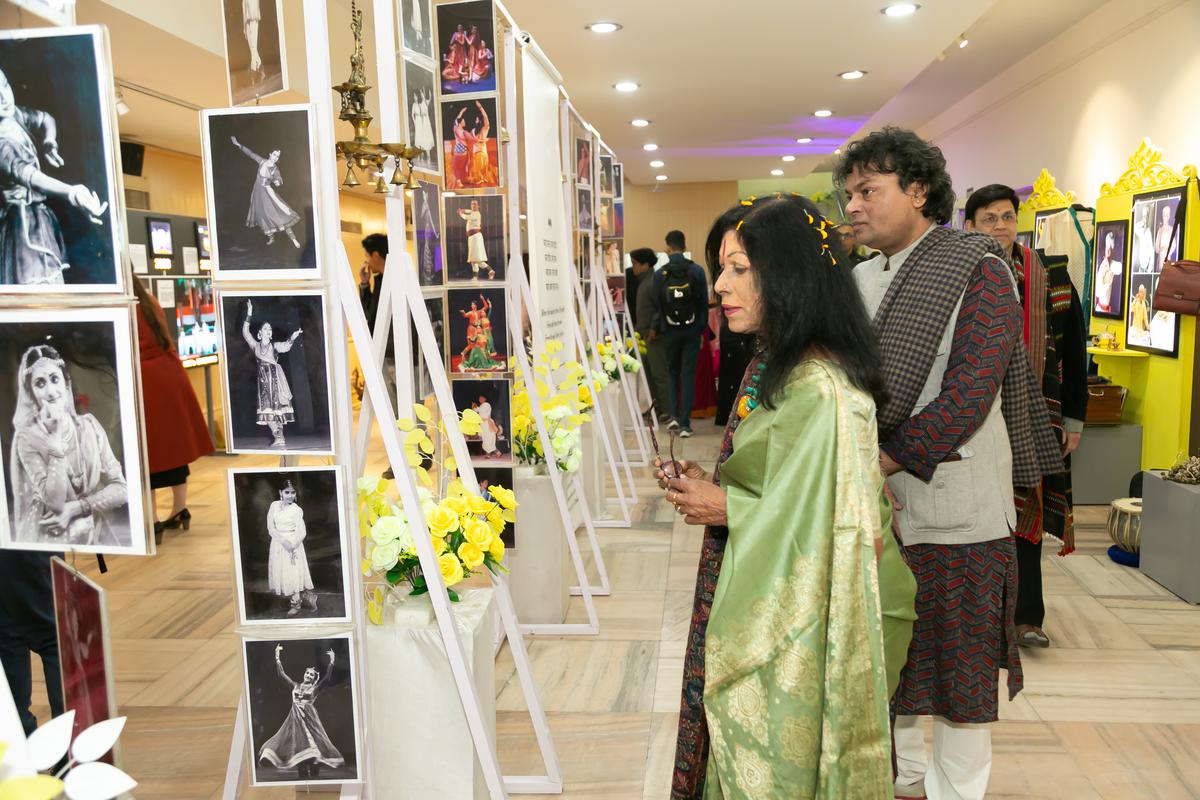 Veteran dancer Shovana Narayan looking at the photographs on display.