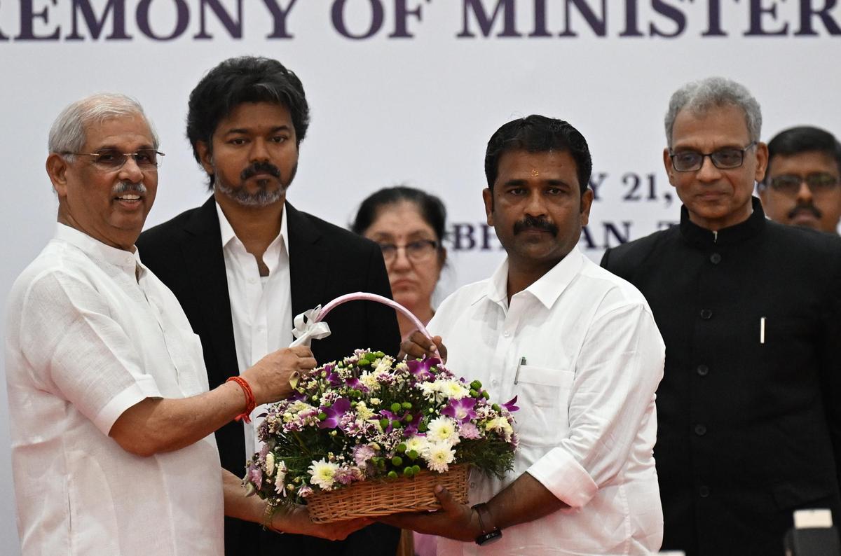 Tamil Nadu Governor Rajendra Vishwanath Arlekar presenting a flower bouquet to the newly sworn-in Minister P. Mathan Raja (Ottapidaram MLA) at Lok Bhavan in Chennai on May 21, 2026