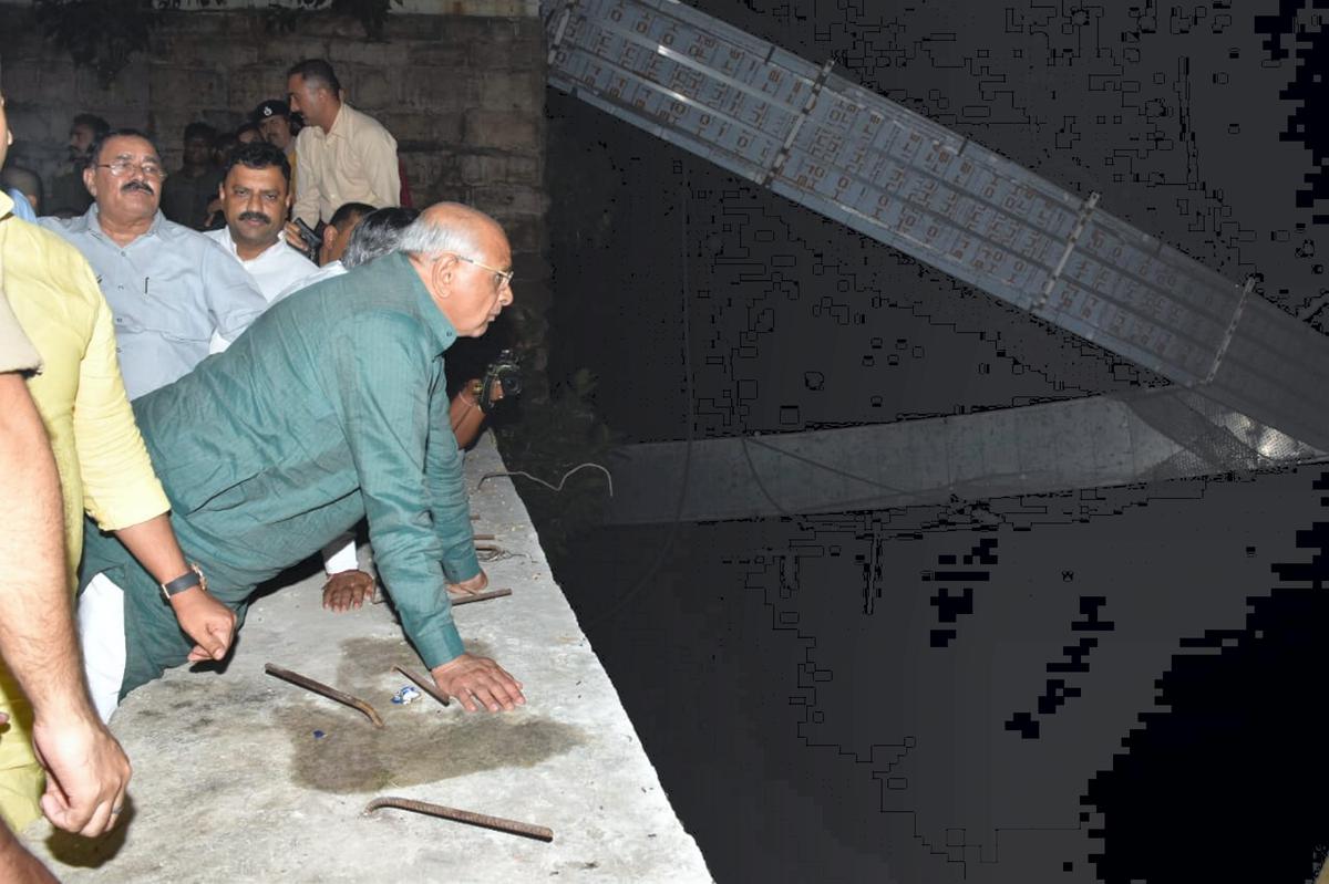 Gujarat Chief Minister Bhupendra Patel at the site to take stock of the situation after an old suspension bridge over the Machchhu river collapsed, in Morbi district on Oct. 30, 2022.