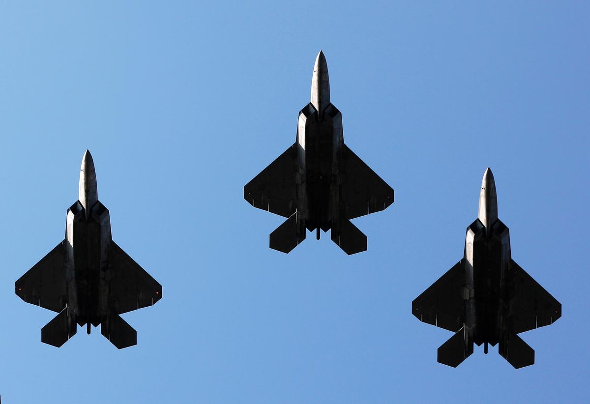 F-22 aircraft fighters conduct a flyover during a Fourth of July celebration at the White House, on July 4, 2025. F-22 aircraft fighters conduct a flyover during a Fourth of July celebration at the White House, on July 4, 2025.