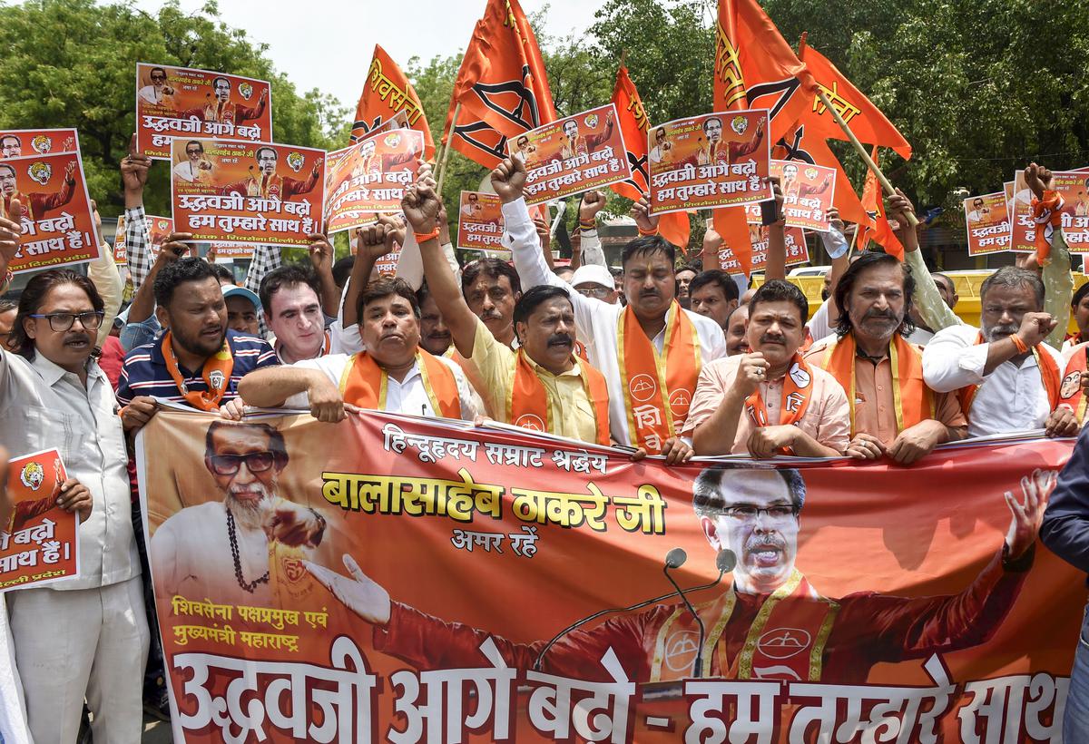 Shiv Sena supporters stage a protest in support of  Uddhav Thackeray at Jantar Mantar in New Delhi on June 26.