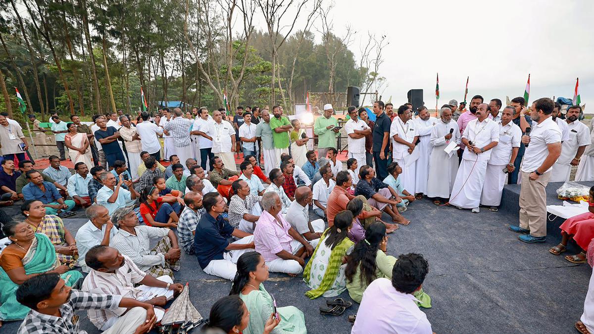 Congress leader Rahul Gandhi interacts with fishers on the Vadackal beach in Alappuzha  during the party’s Bharat Jodo Yatra on Monday.