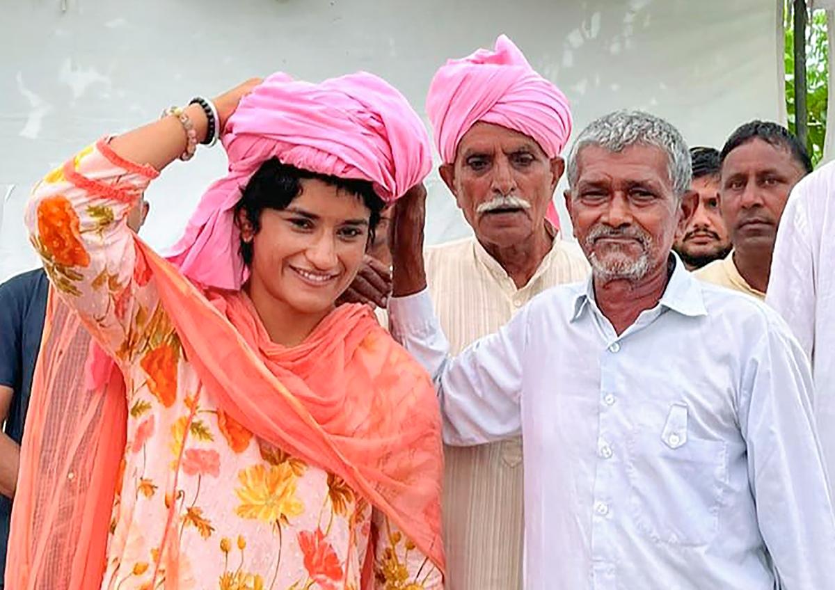 Wrestler and Congress party candidate Vinesh Phogat campaigns in Dhigana village ahead of Haryana Assembly polls.