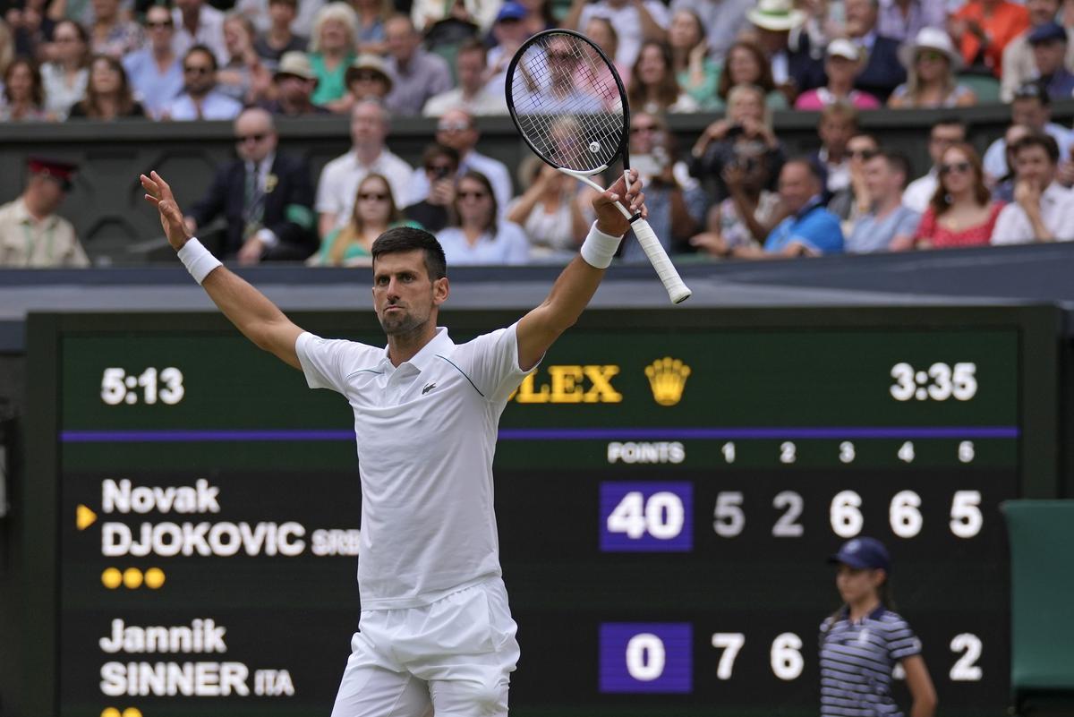 Serbia’s Novak Djokovic celebrates after beating Italy’s Jannik Sinner in a men’s singles quarterfinal match on day nine of the Wimbledon tennis championships in London.