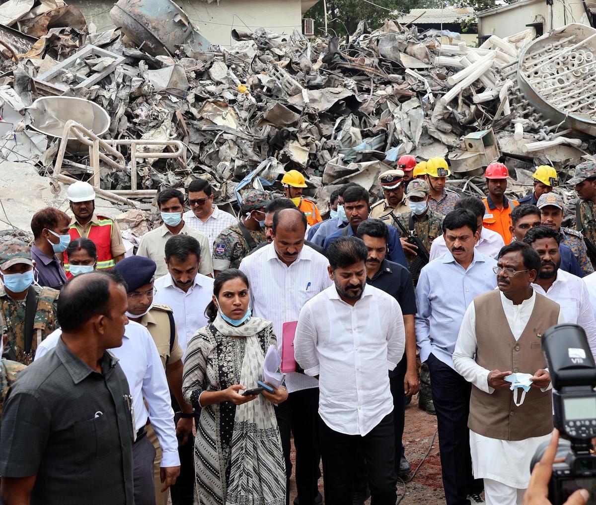 Sangareddy District Collector Pravinya with Telangana Chief Minister A. Revanth Reddy and other ministers during an inspection of the site of an explosion at the Sigachi Industries pharma plant in Sangareddy district on Tuesday (July 01). 