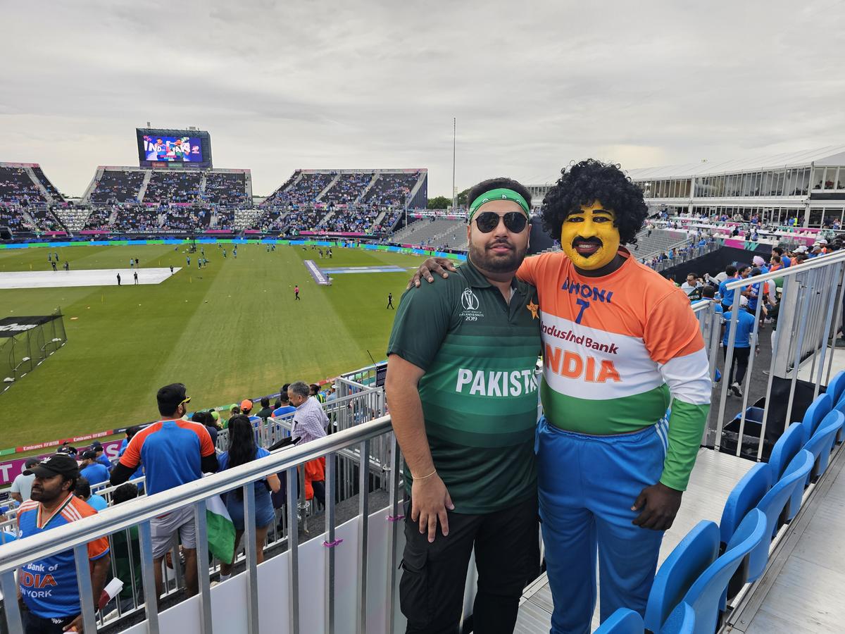 Saravanan Hari with a Pakistani supporter at the World T20 in New York 