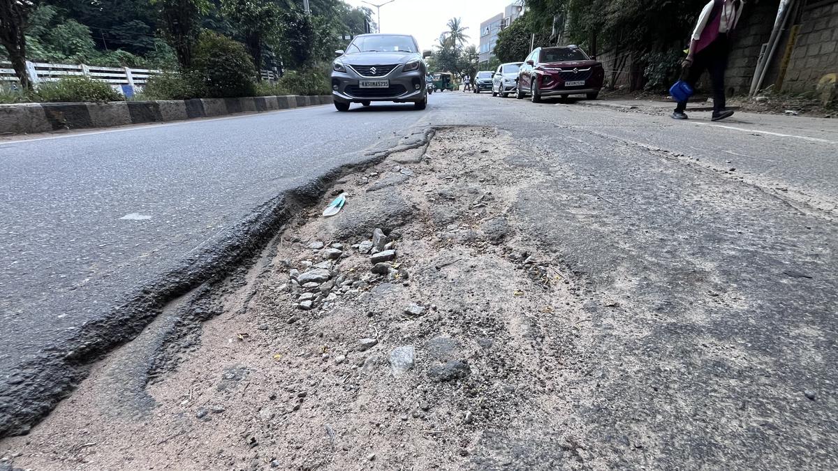 Bengaluru rains: Potholes resurface yet again affecting Bengaluru traffic -  The Hindu