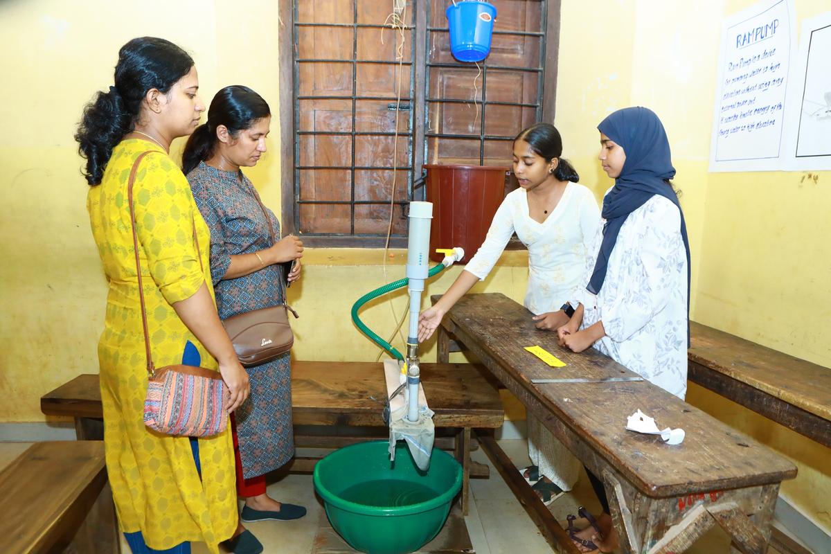 A.S. Vagda and Nifa Nourin of Government Higher Secondary School, Kallachi  showcasing RAM pump at the working model competition for high school students at the State School Science Festival in Alappuzha on Saturday.