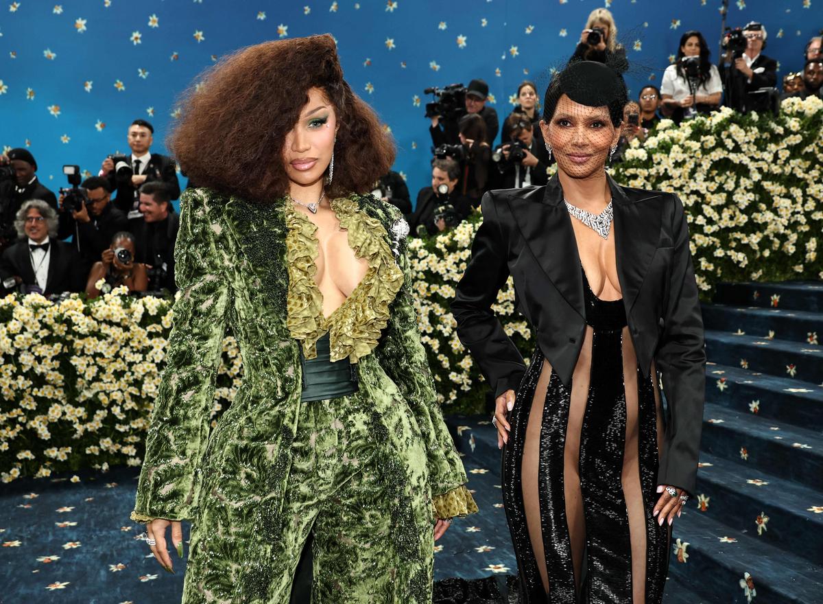 (L-R) Cardi B and Halle Berry attend the 2025 Met Gala Celebrating “Superfine: Tailoring Black Style” at Metropolitan Museum of Art on May 05, 2025 in New York City.