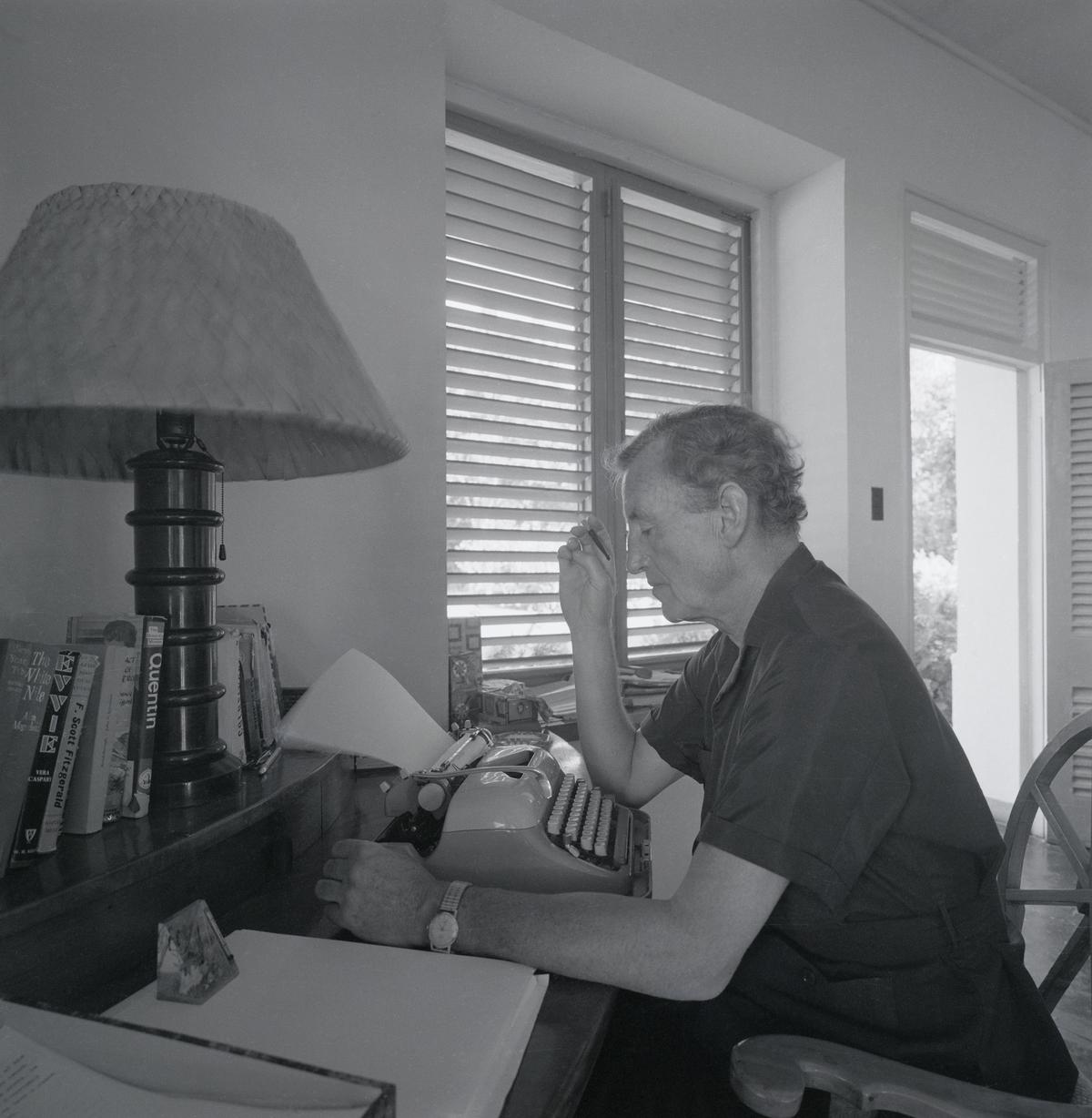 Ian Fleming at his typewriter. 